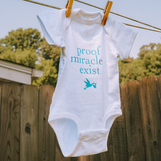 Proof Miracles Exist Onesie